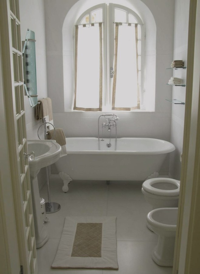 The bathtub beneath the window